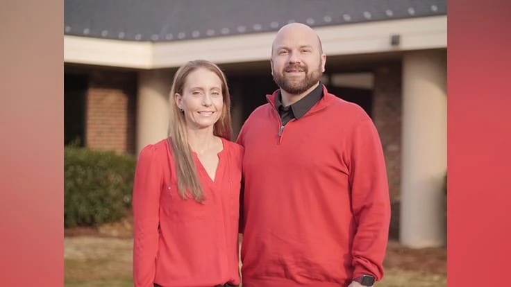 Go-Forth Pest Control of Greensboro, N.C. participated in Go Red Day. Pictured, company vice president Leah Hazelwood and Chase Hazelwood, CEO and owner, pose for a photo in red shirts..