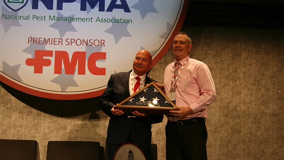 Pictured: Chris Haggerty (right) accepts the FMC Legislative Day from FMC's Dan Carrothers.