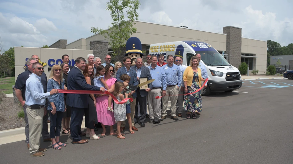 Photo of Cook's Pest Control employees at the new office ribbon cutting.