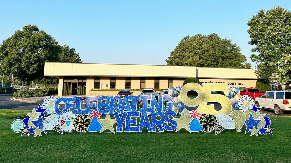 A sign sits in front of the company's office to recognize the 95th anniversary.